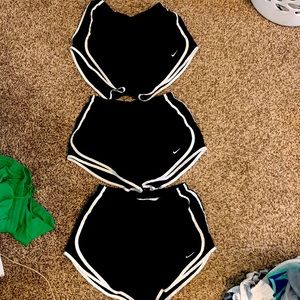 3 pairs of Nike running shorts